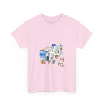 Santorini-inspired pink graphic tee perfect for summer vacations; custom t-shirt for travelers, My Name Is POD.